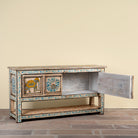 Image showing open door of a Aakash hand painted reclaimed wood console table with blue floral and elephant motifs, storage and open shelf 114cm