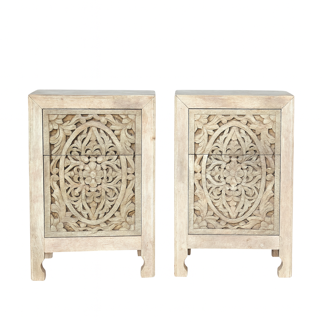 White background image of a pair of hand-carved nightstands made of sandblasted mango wood with floral Mediterranean patterns and two drawers – Aanya bedside tables by Om Home & Garden