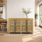 Lifestyle image of a aashish-hand-painted-sideboard-reclaimed-wood-150cm with floral design.
