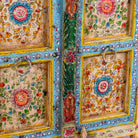 Close up image of a Aashish-hand-painted-sideboard-reclaimed-wood-150cm with floral design.
