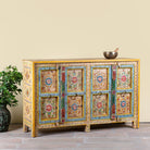 Side angle image of a Aashish-hand-painted-sideboard-reclaimed-wood-150cm with floral design.