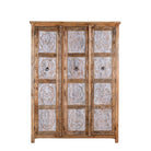 White background image of a hand carved wardrobe with floral design made of mango wood in vintage style.