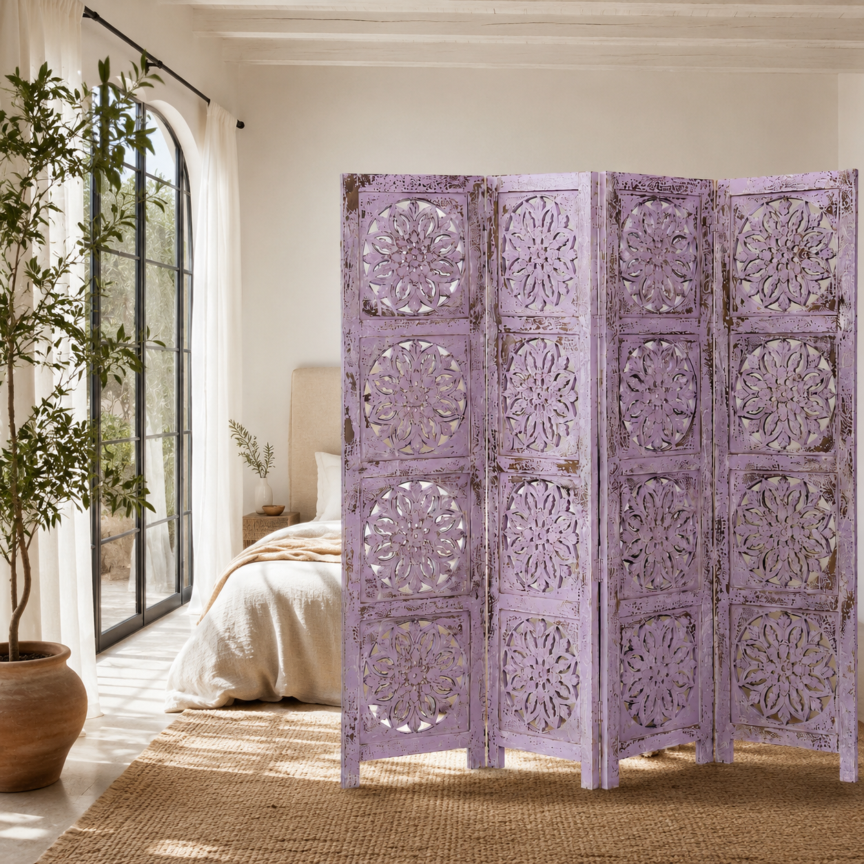 Lifestyle image of a hand-carved violet mango wood folding room divider with delicate carved patterns, natural variations, and warm boho style for unique interiors.