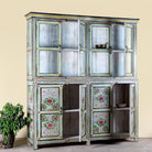 Side angle image with open doors of a large hand painted, 2 parts, Mango wood display cabinet wit 8 doors and ample inside storage in vintage design.