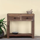 Image of a reclaimed wood console table with 2 drawers and one shelf in driftwood style.