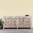 Image of an Indian antique door sideboard with ample storage and original iron settings.
