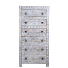 White background image of a hand carved white washed mango wood chest of 6 drawers in mediterranean design with iron 
handles.