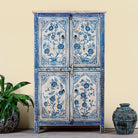 Image of a unique hand painted wardrobe made of reclaimed wood with floral design, 4 doors and ample storage.