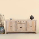 Sandblasted wooden sideboard with three compartments and two small drawers, Ibiza style living room furniture in light natural finish, 200×40×90 cm.