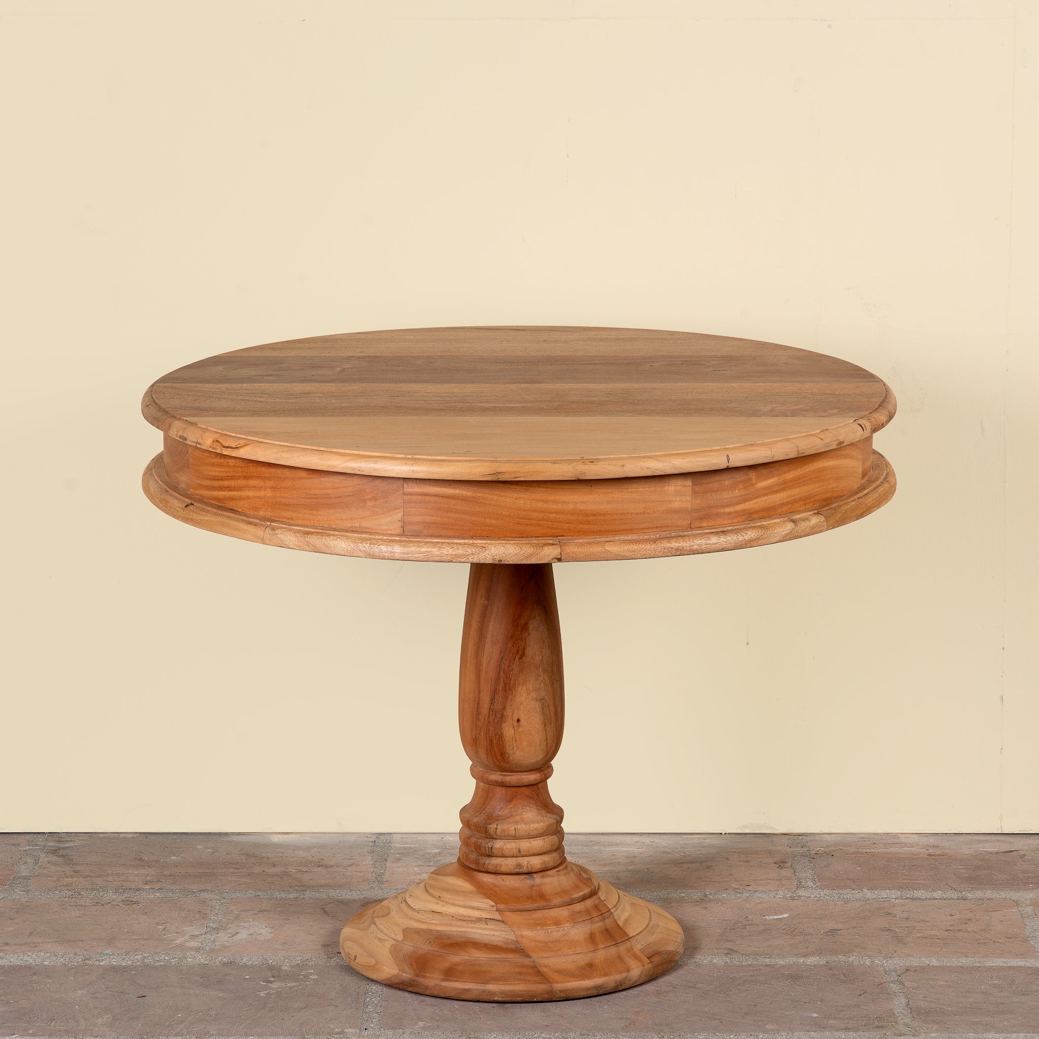 round solid wood dining table made from reclaimed teak with carved pedestal base; rustic reclaimed teak wood dining table, 100 cm diameter × 78 cm height.