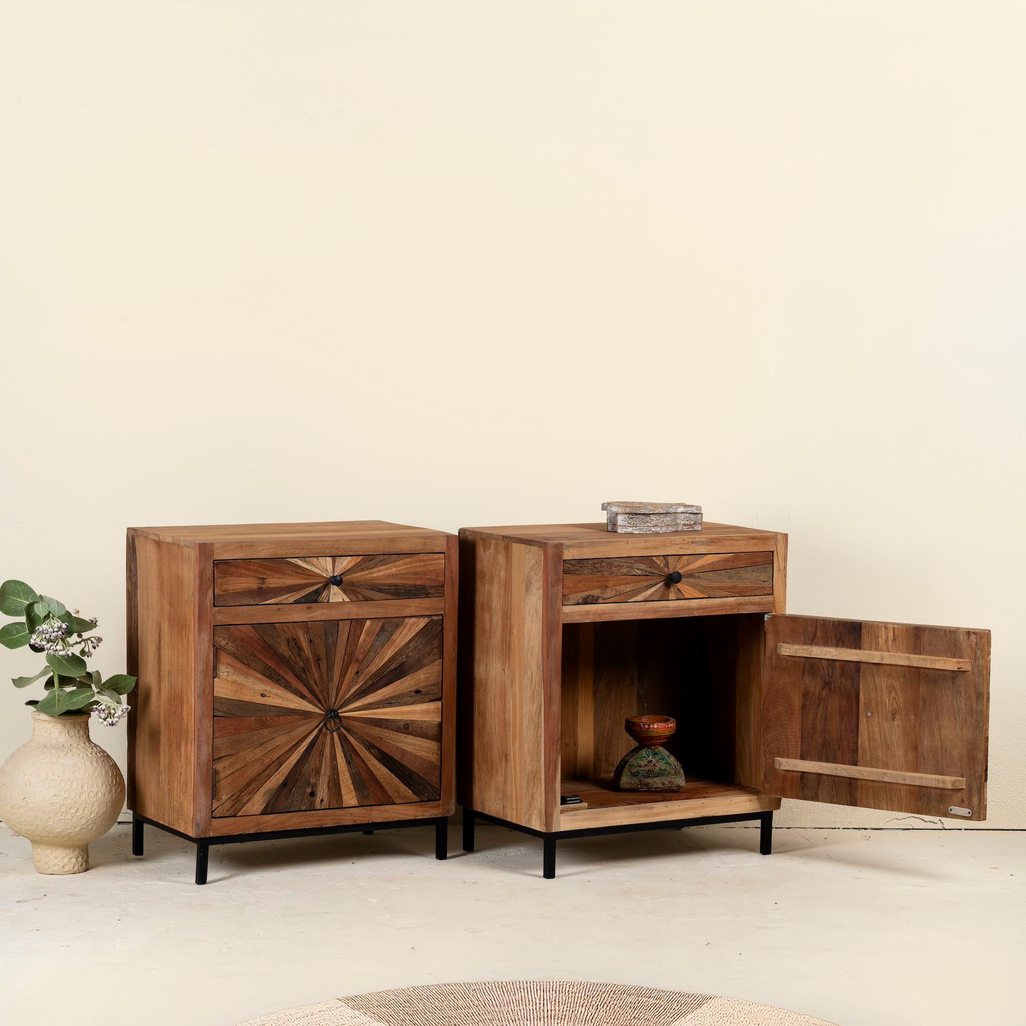 Open door image of a driftwood cabinet with sunburst front pattern and iron legs, one drawer and cabinet; looks great as sink base cabinet or accent furniture, 63 × 40 × 73 cm.