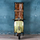 Front part image of Ahana high bar table featuring the front half of a vintage Bajaj scooter, with tall wooden shelving and an industrial metal frame, designed for stylish bar storage.