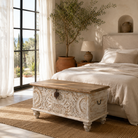 Ahil hand carved mango wood storage box with floral front panels, whitewashed finish, natural wood top, and iron side handles.