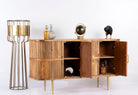 Side angle image with open door of a handcrafted mango wood sideboard with curved door panels and brass-plated legs—minimalistic style living room furniture with natural elegance.