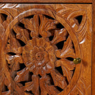 Close up image of a pair of pair of mango wood night stands with hand carved floral and geometric detailing, warm teak finish; elegant hand carved furniture, 45 × 35 × 65 cm.