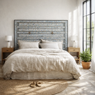 Lifestyle image with a Akshi hand painted head board made from an antique Indian teak door, featuring traditional floral motifs in blue and cream and original iron hardware—an elegant example of hand painted head boards and authentic Indian headboards.