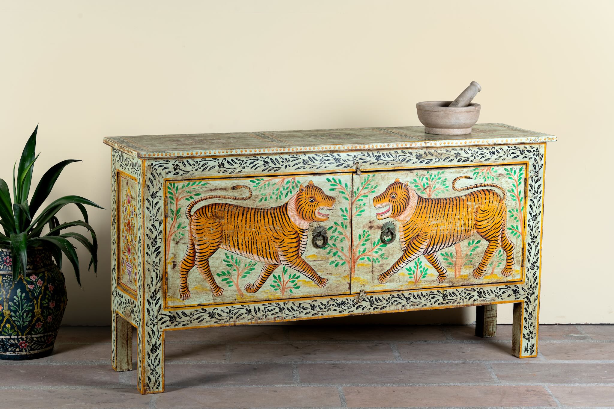 Side angle image of a reclaimed wood console table Alina in a Boho Tiger design, featuring hand-painted tigers and floral details. A bold piece of artisanal furniture perfect for colourful and eclectic bohemian interiors.