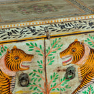 Close up image of a reclaimed wood console table Alina in a Boho Tiger design, featuring hand-painted tigers and floral details. A bold piece of artisanal furniture perfect for colourful and eclectic bohemian interiors.