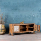 Open door image of a wood carved sideboard Alka, Indian furniture made from mango wood with floral carvings, whitewashed finish, 150 × 40 × 60 cm.