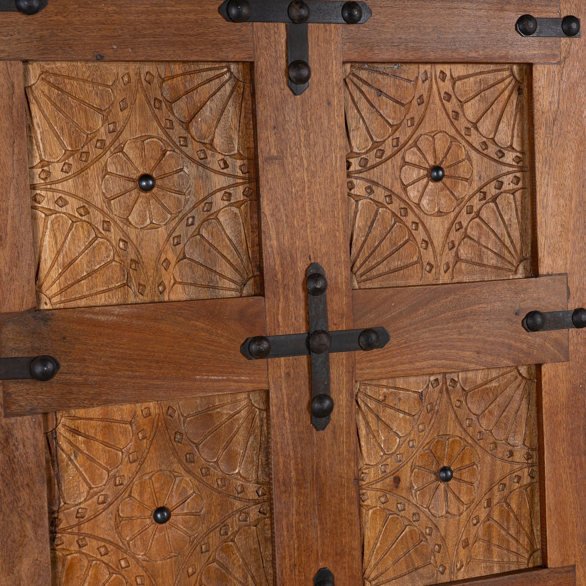 Close up image of Amar sliding door panel, reclaimed wood Indian door with carvings and iron fittings, vintage wall panel design, 80 × 5 × 220 cm.