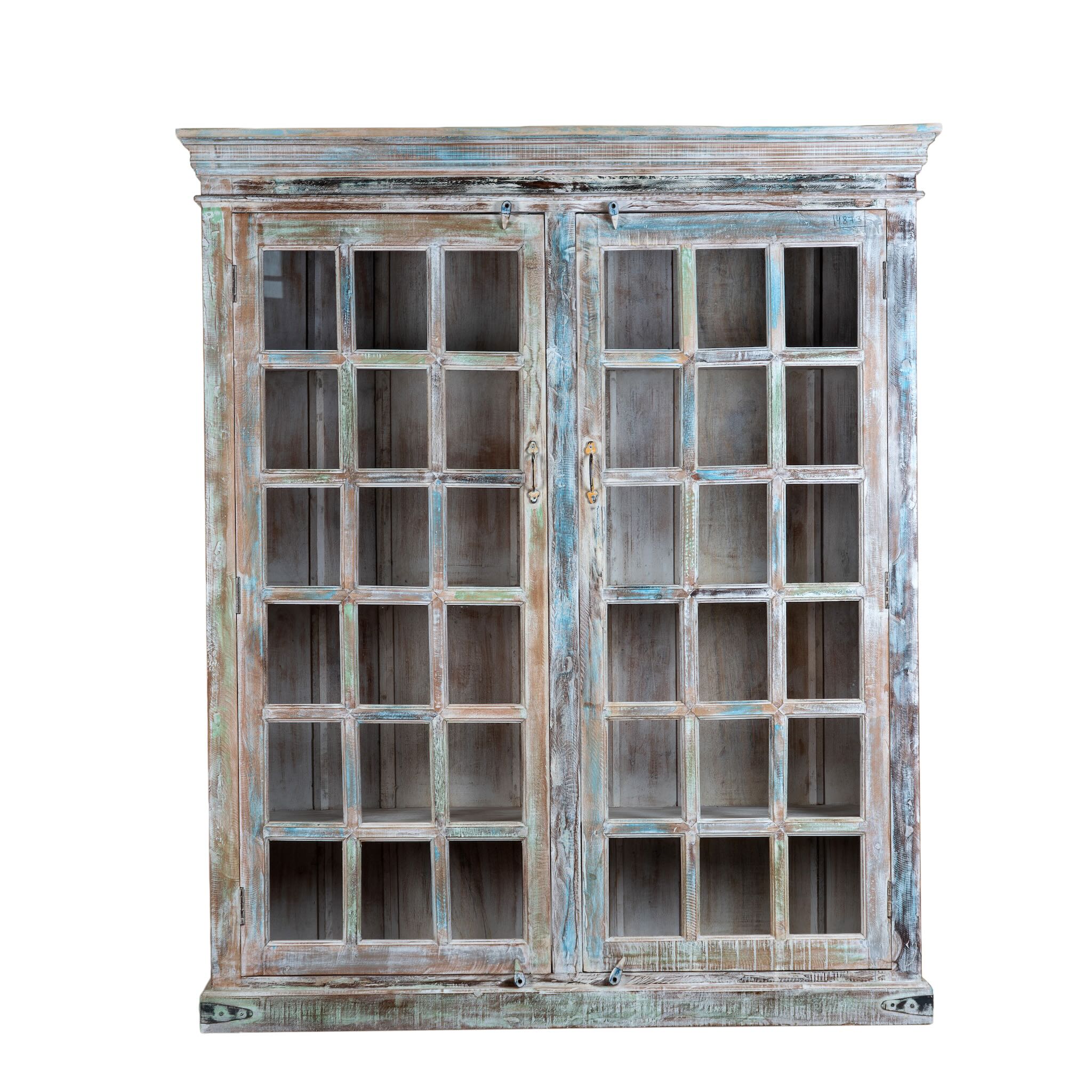 White background image of a reclaimed wood display cabinet Amara with distressed turquoise finish and glass-panelled doors. Sustainable living room furniture and vintage furniture piece with spacious shelving and authentic patina.