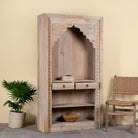 Side angle image with pen drawers of a hand carved entryway shelf with storage and two drawers made of mango wood, hand carved.