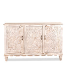 White background image of a hand-carved mango wood sideboard with peacock and foliage motifs, whitewashed finish; perfect for Indian home decor, 150 × 95 × 40 cm.