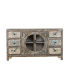 White background image of a hand-painted sideboard Anaya made from reclaimed wood with six drawers and two glass doors, featuring detailed animal and floral motifs. A sustainable piece of boho-style artisanal furniture with colourful heritage design.