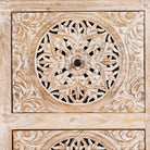 Close up image of a hand-carved mango wood sideboard with Mediterranean drawer motifs and whitewashed finish; ideal carved sideboard or entryway table vintage, 150 × 90 × 40 cm.