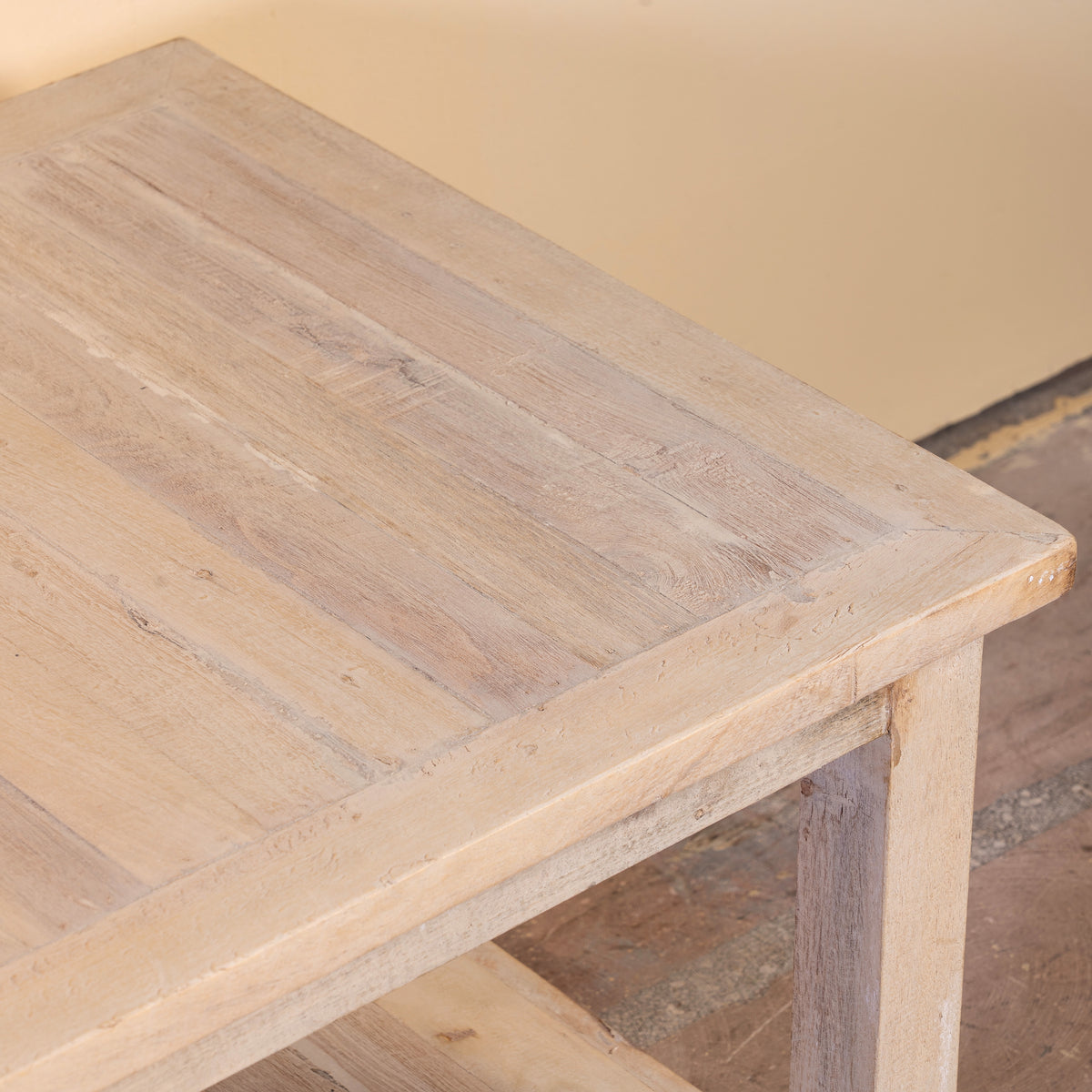 Close up image of a Anil bleached reclaimed wood coffee table with rectangular top and full-width lower storage shelf, 120x60x50cm