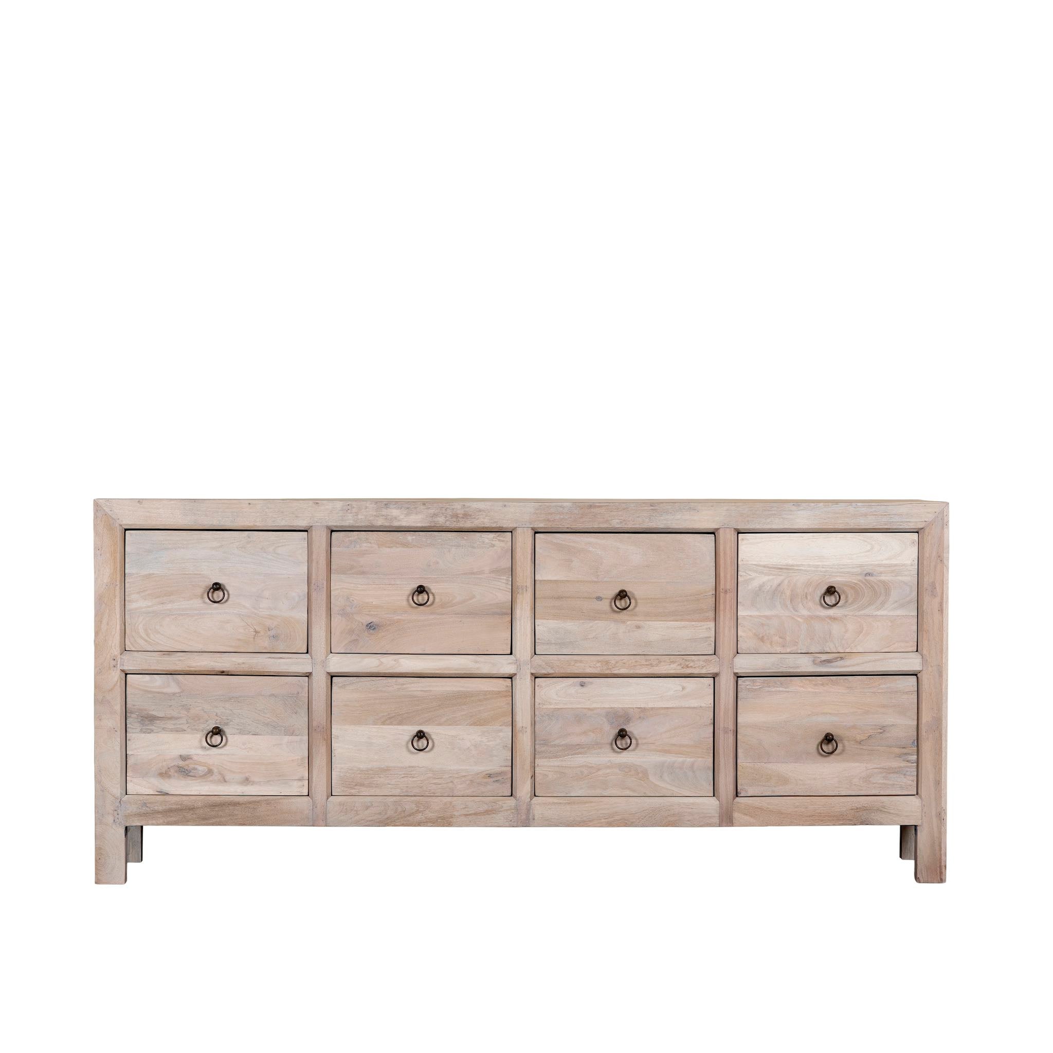 White background image of a Ibiza style chest of drawers made from sandblasted reclaimed wood, coastal furniture with 8 drawers and vintage metal pulls, 200 × 40 × 90 cm.