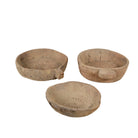 White background image of a hand-carved old teak wood plate with traditional Indian motifs and rustic finish, ideal for vintage home decoration and Indian home decor.
