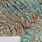 Close up image of a carved mango wood mirror Anumati with floral hand-carving and distressed finish. A unique Indian furniture piece perfect for vintage home decor and bohemian interiors.