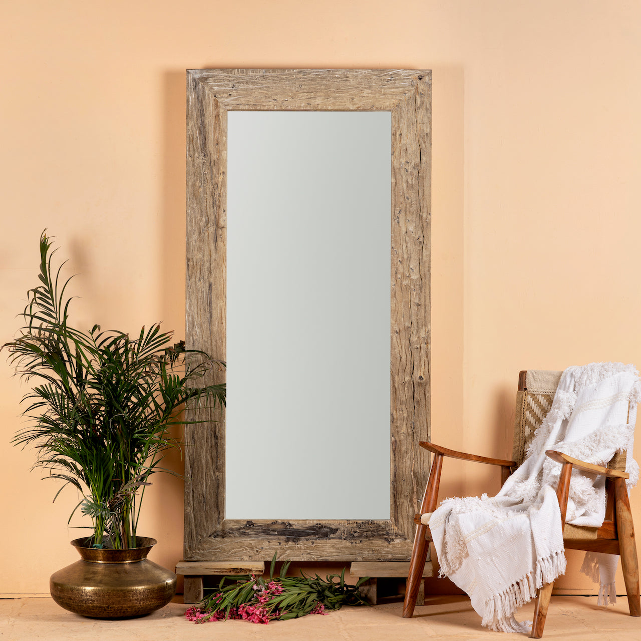 Reclaimed wood mirror Aranyani with sanded beach wood texture and minimalist design. A Japandi style mirror handcrafted in Rajasthan, offering rustic charm and sustainable elegance.