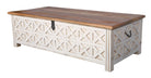 White background image of a hand-carved mango wood vintage chest front view – styled in Mediterranean living room with books, candles, natural textures, and soft daylight.