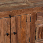 Close up image of a reclaimed wood lowboard Ariana in rustic minimalistic style with four cabinets and two drawers. A sustainable furniture piece offering functional storage and natural texture for modern living spaces.