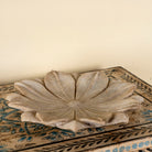 Hand-carved marble flower plate Arika with layered petal design. A vintage home accessory and unique Indian decoration, ideal as a soap dish, jewellery holder, or sweet tray in vintage home decor.