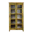 White background image of a hand-painted reclaimed wood showcase cabinet with floral motifs and glass doors, sustainable furniture and vintage home decor style, 96 × 40 × 182 cm.