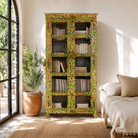 Lifestyle image of a hand-painted reclaimed wood showcase cabinet with floral motifs and glass doors, sustainable furniture and vintage home decor style, 96 × 40 × 182 cm.
