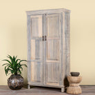 Side angle image of a reclaimed wood wardrobe with panelled double doors and rustic finish; bathroom furniture with ample storage, 100 × 45 × 190 cm.