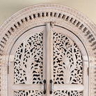 Close up picture of Artha cabinet with Tree of Life carving, a unique furniture piece from our mango wood furniture collection.