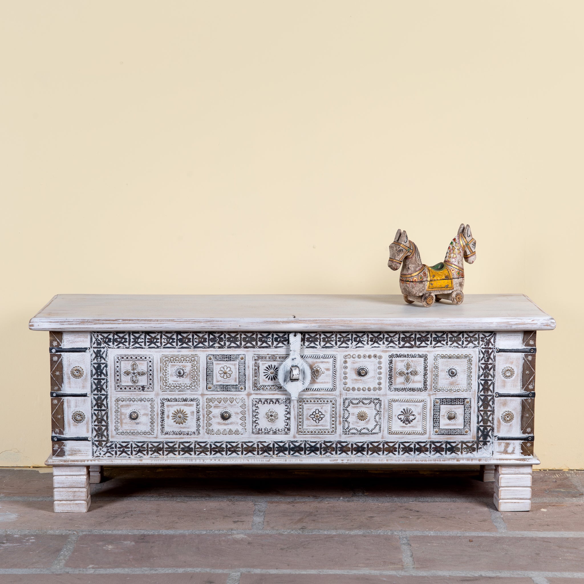 Aryav whitewashed mango wood coffee table chest with decorative iron fittings 116cm