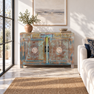 Lifestyle image of a Aryen hand carved reclaimed wood sideboard with vintage house elements and distressed blue turquoise finish 120cm
