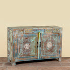 Side angle image of a Aryen hand carved reclaimed wood sideboard with vintage house elements and distressed blue turquoise finish 120cm