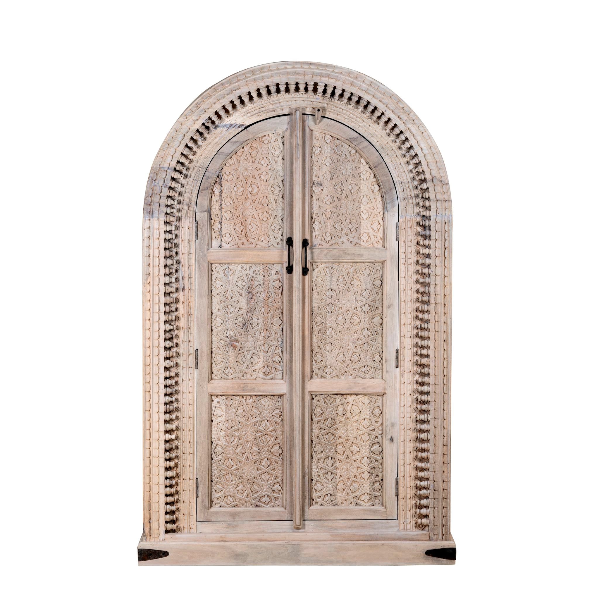 White background picture of Ashwin wardrobe with arched carved doors, a unique furniture design from our mango wood furniture collection.