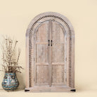 Ashwin wardrobe with arched carved doors, a unique furniture design from our mango wood furniture collection.