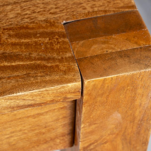 Close up image of a rectangular solid wood dining table crafted from reclaimed teak; minimalist style reclaimed wood dining table, 180 × 100 × 77 cm.