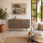 Lifestyle image of Avighna sideboard styled in a contemporary interior with brass accents.