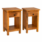 Side angle image of a Avni handcrafted mango wood bedside table set of two with drawer and open shelf, solid wood bedroom furniture, 45x35x65cm each.