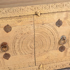 Close up image of a Ayra reclaimed teak wood sideboard with hand carved Orissa house door elements and original iron fittings 123cm
